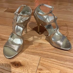 Stuart Weitzman gold sparkle strappy heels in size 6.5M open toe